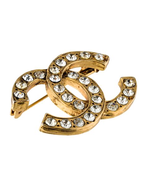 chanel vintage cc brooch|wholesale Chanel brooches.